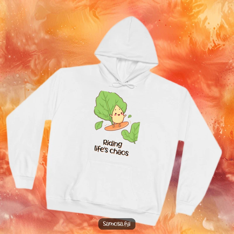 Funny hoodie showing a happy samosa with small legs, confidently surfing on a large green spinach leaf, embodying adventure.