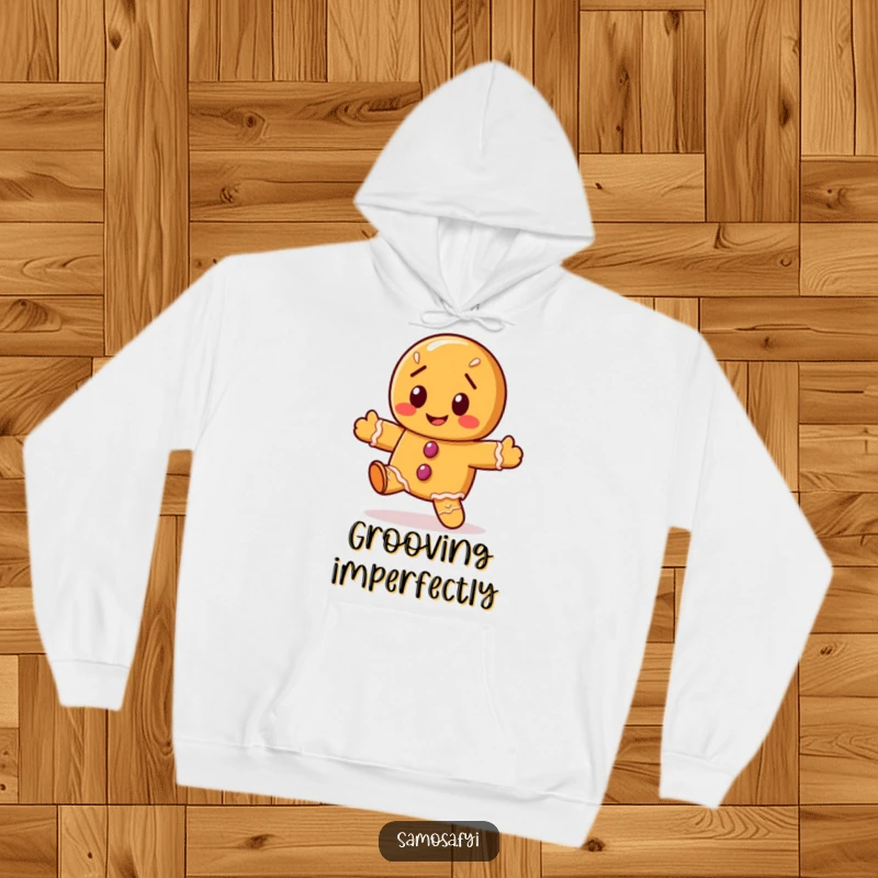 Funny gingerbread cookie hoodie graphic of the character doing a wobbly, cheerful dance, great for cozy humor.