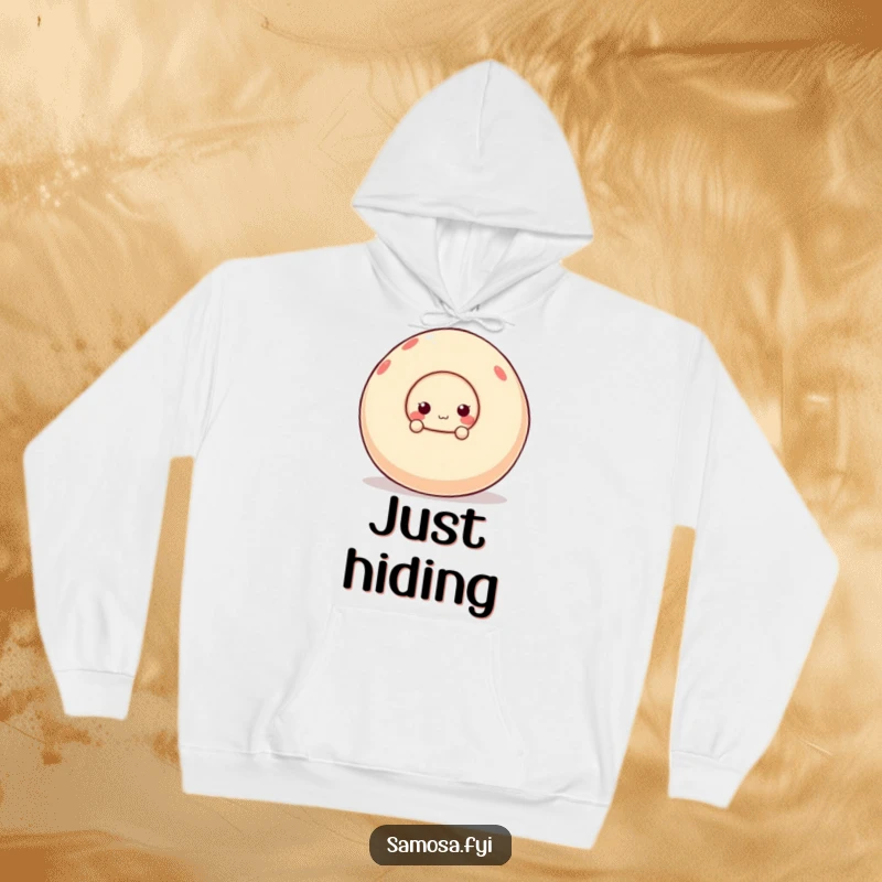 Funny hoodie featuring an adorable samosa character peeking mischievously behind a large, wobbling ball, exuding playful charm.