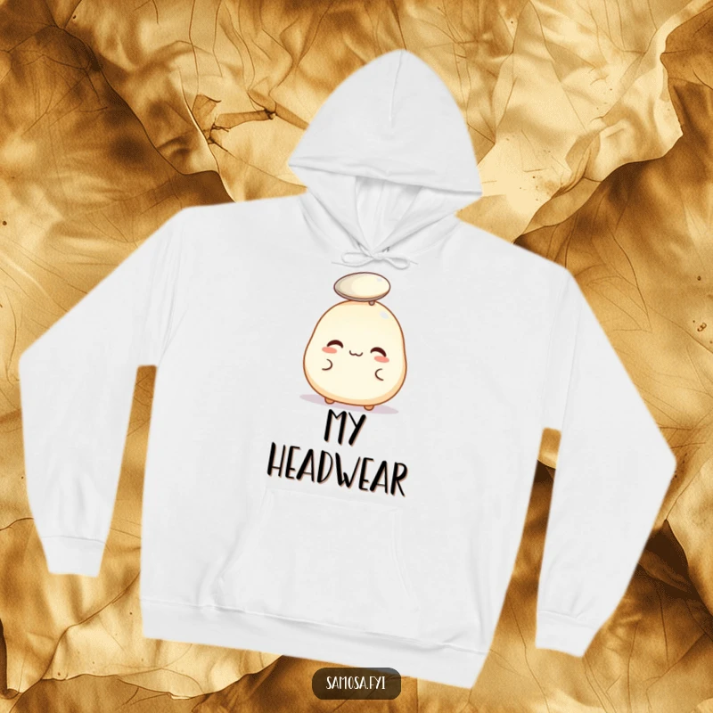 Funny hoodie featuring a pastry puff precariously balancing a tiny spoon on its head, bringing charm and humor.